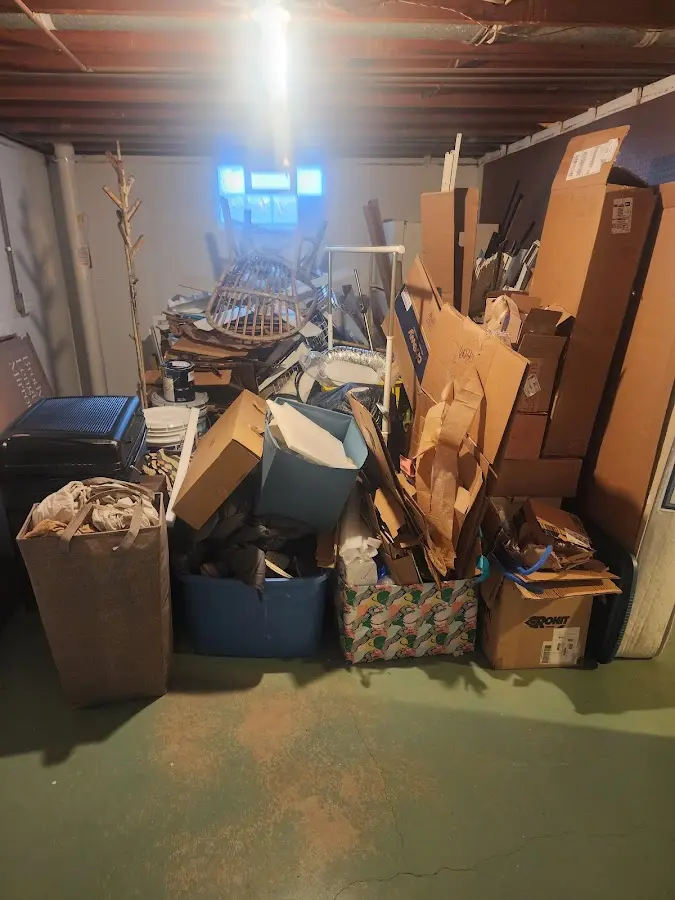 Roll-off dumpster container at job site for Cleanout Dumpster Rental in Gibson